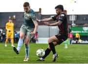 19 April 2024; Jack Keaney of Drogheda United in action against Adam McDonnell of Bohemians during the SSE Airtricity Men's Premier Division match between Bohemians and Drogheda United at Dalymount Park in Dublin. Photo by Shauna Clinton/Sportsfile
