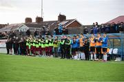 19 April 2024; Players and management from both teams during a moments applause before the SSE Airtricity Men's First Division match between Cobh Ramblers and Finn Harps at St Coleman's Park in Cobh, Cork. Photo by Michael P Ryan/Sportsfile
