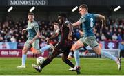 19 April 2024; James Akintunde of Bohemians is tackled by Jack Keaney of Drogheda United during the SSE Airtricity Men's Premier Division match between Bohemians and Drogheda United at Dalymount Park in Dublin. Photo by Shauna Clinton/Sportsfile