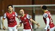 19 April 2024; Brandon Kavanagh of St Patrick's Athletic celebrates with team-mates Ruairí Keating, left, and Jake Mulraney, right, after scoring their side's first goal during the SSE Airtricity Men's Premier Division match between St Patrick's Athletic and Waterford at Richmond Park in Dublin. Photo by Piaras Ó Mídheach/Sportsfile