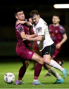 19 April 2024; Luke O'Brien of Finn Harps in action against David Bosnjak of Cobh Ramblers  during the SSE Airtricity Men's First Division match between Cobh Ramblers and Finn Harps at St Coleman's Park in Cobh, Cork. Photo by Michael P Ryan/Sportsfile
