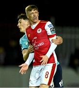 19 April 2024; Chris Forrester of St Patrick's Athletic and Harvey Macadam of Waterford during the SSE Airtricity Men's Premier Division match between St Patrick's Athletic and Waterford at Richmond Park in Dublin. Photo by Piaras Ó Mídheach/Sportsfile