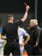 19 April 2024; Galway United manager John Caulfield, right, is shown a red card by referee Damien MacGraith during the SSE Airtricity Men's Premier Division match between Galway United and Shelbourne at Eamonn Deacy Park in Galway. Photo by Sam Barnes/Sportsfile