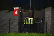 19 April 2024; Stewards try to keep an exit closed from being opened from the outside during the SSE Airtricity Men's Premier Division match between Derry City and Shamrock Rovers at the Ryan McBride Brandywell Stadium in Derry. Photo by Stephen McCarthy/Sportsfile