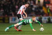 19 April 2024; Darragh Nugent of Shamrock Rovers in action against Will Patching of Derry City during the SSE Airtricity Men's Premier Division match between Derry City and Shamrock Rovers at the Ryan McBride Brandywell Stadium in Derry. Photo by Stephen McCarthy/Sportsfile