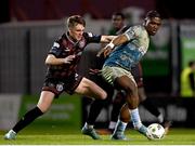 19 April 2024; Frantz Pierrot of Drogheda United is tackled by Cian Byrne of Bohemians during the SSE Airtricity Men's Premier Division match between Bohemians and Drogheda United at Dalymount Park in Dublin. Photo by Shauna Clinton/Sportsfile