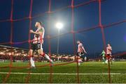 19 April 2024; Derry City players, from left, Cameron McJannet, Ronan Boyce and Adam O'Reilly react to a Shamrock Rovers goal during the SSE Airtricity Men's Premier Division match between Derry City and Shamrock Rovers at the Ryan McBride Brandywell Stadium in Derry. Photo by Stephen McCarthy/Sportsfile