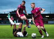 19 April 2024; Success Edogun of Finn Harps in action against Cian Browne, left, and Jason Abbott of Cobh Ramblers during the SSE Airtricity Men's First Division match between Cobh Ramblers and Finn Harps at St Coleman's Park in Cobh, Cork. Photo by Michael P Ryan/Sportsfile