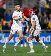 19 April 2024; John Cooney of Ulster, left, with Mike Lowry, after kicking a penalty during the United Rugby Championship match between Ulster and Cardiff at the Kingspan Stadium in Belfast. Photo by Ramsey Cardy/Sportsfile