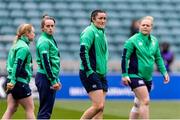 20 April 2024; Ireland players, from left, Molly Scuffil-McCabe, Hannah O'Connor and Sadhbh McGrath walk on the pitch prior to the Women's Six Nations Rugby Championship match between England and Ireland at Twickenham Stadium in London, England. Photo by Juan Gasparini/Sportsfile