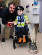 20 April 2024; John O'Shea meets patient Noah Quish from Limerick while visiting with the UEFA Europa League trophy to Children’s Health Ireland at Crumlin to raise spirits for the families and children at the hospital as part of the trophy tour this week. Your support can help give children & young people the very best chance in Children's Health Ireland at Crumlin, Temple Street, Tallaght & Connolly. Donations can be made at www.childrenshealth.ie. Photo by Matt Browne/Sportsfile