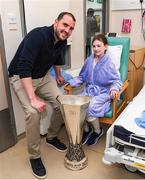 20 April 2024; John O'Shea meets Ella McBride while visiting with the UEFA Europa League trophy to Children’s Health Ireland at Crumlin to raise spirits for the families and children at the hospital as part of the trophy tour this week. Your support can help give children & young people the very best chance in Children's Health Ireland at Crumlin, Temple Street, Tallaght & Connolly. Donations can be made at www.childrenshealth.ie. Photo by Matt Browne/Sportsfile
