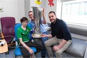 20 April 2024; John O'Shea meets 10 year old Conor Collins and his dad John from Dublin while visiting with the UEFA Europa League trophy to Children’s Health Ireland at Crumlin to raise spirits for the families and children at the hospital as part of the trophy tour this week. Your support can help give children & young people the very best chance in Children's Health Ireland at Crumlin, Temple Street, Tallaght & Connolly. Donations can be made at www.childrenshealth.ie. Photo by Matt Browne/Sportsfile