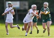 20 April 2024; Ruth O'Connor of Kerry in action against Sadhbh Buckley of Kildare during the Electric Ireland Camogie Minor B All-Ireland semi-final match between Kerry and Kildare at Banagher in Offaly. Photo by Stephen Marken/Sportsfile