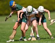 20 April 2024; Louise Murphy of Kildare in action against Kathryn Ryan, left, and Kate Maunsell of Kerry during the Electric Ireland Camogie Minor B All-Ireland semi-final match between Kerry and Kildare at Banagher in Offaly. Photo by Stephen Marken/Sportsfile
