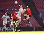 20 April 2024; Ciarán Frawley of Leinster and Morne van den Berg of Emirates Lions contest a high ball during the United Rugby Championship match between Emirates Lions and Leinster at Emirates Airline Park in Johannesburg, South Africa. Photo by Harry Murphy/Sportsfile