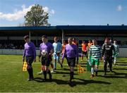 20 April 2024; Players and officials make their way out for the start of the game during the FAI Youth Cup final match between St Kevin’s FC, DDSL, and Pike Rovers, Limerick District League at Home Farm FC in Dublin. Photo by Michael P Ryan/Sportsfile