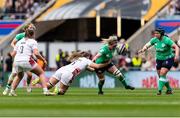 20 April 2024; Edel McMahon of Ireland is tackled by Zoe Aldcroft of England during the Women's Six Nations Rugby Championship match between England and Ireland at Twickenham Stadium in London, England. Photo by Juan Gasparini/Sportsfile