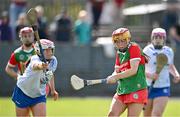 20 April 2024; Ciara Kennedy of Mayo in action against Phillipa Hughes of Cavan during the Electric Ireland All-Ireland Camogie Minor B Championship semi-final 1 match between Cavan and Mayo at Duggan Park in Ballinasloe, Galway. Photo by Sam Barnes/Sportsfile