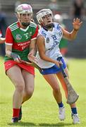 20 April 2024; Megan O'Malley of Mayo in action against Jackie Prendergast of Carlow during the Electric Ireland All-Ireland Camogie Minor B Championship semi-final 1 match between Cavan and Mayo at Duggan Park in Ballinasloe, Galway. Photo by Sam Barnes/Sportsfile