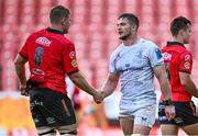 20 April 2024; Scott Penny of Leinster shakes hands with Francke Horn of Emirates Lions after the United Rugby Championship match between Emirates Lions and Leinster at Emirates Airline Park in Johannesburg, South Africa. Photo by Harry Murphy/Sportsfile