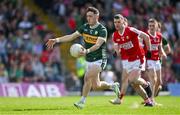 20 April 2024; Paudie Clifford of Kerry in action against Maurice Shanley of Cork during the Munster GAA Football Senior Championship semi-final match between Kerry and Cork at Fitzgerald Stadium in Killarney, Kerry. Photo by Brendan Moran/Sportsfile