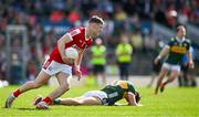 20 April 2024; Daniel O'Mahony of Cork gathers possession from David Clifford of Kerry during the Munster GAA Football Senior Championship semi-final match between Kerry and Cork at Fitzgerald Stadium in Killarney, Kerry. Photo by Brendan Moran/Sportsfile