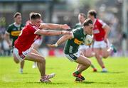 20 April 2024; Dara Moynihan of Kerry in action against Tommy Walsh of Cork during the Munster GAA Football Senior Championship semi-final match between Kerry and Cork at Fitzgerald Stadium in Killarney, Kerry. Photo by Brendan Moran/Sportsfile
