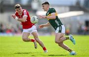 20 April 2024; Sean O'Shea of Kerry in action against Daniel O'Mahony of Cork during the Munster GAA Football Senior Championship semi-final match between Kerry and Cork at Fitzgerald Stadium in Killarney, Kerry. Photo by Brendan Moran/Sportsfile