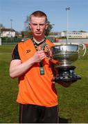 20 April 2024; St Kevin’s FC captain Logan O'Connell with the cup after the FAI Youth Cup final match between St Kevin’s FC, DDSL, and Pike Rovers, Limerick District League at Home Farm FC in Dublin. Photo by Michael P Ryan/Sportsfile