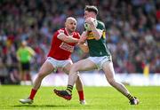 20 April 2024; Cillian Burke of Kerry is tackled by Brian O'Driscoll of Cork during the Munster GAA Football Senior Championship semi-final match between Kerry and Cork at Fitzgerald Stadium in Killarney, Kerry. Photo by Brendan Moran/Sportsfile
