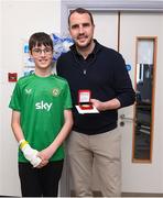 20 April 2024; John O'Shea meets 14 year old Conor Keegan from Castlebar, Mayo, while visiting with the UEFA Europa League trophy to Children’s Health Ireland at Crumlin to raise spirits for the families and children at the hospital as part of the trophy tour this week. Your support can help give children & young people the very best chance in Children's Health Ireland at Crumlin, Temple Street, Tallaght & Connolly. Donations can be made at www.childrenshealth.ie. Photo by Matt Browne/Sportsfile