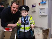 20 April 2024; John O'Shea meets Noah Quish from Limerick, while visiting with the UEFA Europa League trophy to Children’s Health Ireland at Crumlin to raise spirits for the families and children at the hospital as part of the trophy tour this week. Your support can help give children & young people the very best chance in Children's Health Ireland at Crumlin, Temple Street, Tallaght & Connolly. Donations can be made at www.childrenshealth.ie. Photo by Matt Browne/Sportsfile