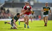 20 April 2024; Brian Hurley of Cork is tackled by Daniel O'Mahony of Cork during the Munster GAA Football Senior Championship semi-final match between Kerry and Cork at Fitzgerald Stadium in Killarney, Kerry. Photo by Brendan Moran/Sportsfile