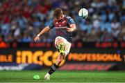 20 April 2024; Jack Crowley of Munster kicks a penalty during the United Rugby Championship match between Vodacom Bulls and Munster at Loftus Versfeld Stadium in Pretoria, South Africa. Photo by Shaun Roy/Sportsfile