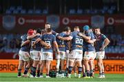20 April 2024; Munster players huddle during the United Rugby Championship match between Vodacom Bulls and Munster at Loftus Versfeld Stadium in Pretoria, South Africa. Photo by Shaun Roy/Sportsfile