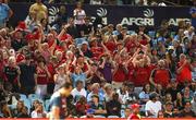 20 April 2024; Munster fans celebrate a try during the United Rugby Championship match between Vodacom Bulls and Munster at Loftus Versfeld Stadium in Pretoria, South Africa. Photo by Shaun Roy/Sportsfile
