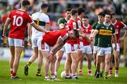 20 April 2024; Paul Walsh of Cork, left, consoles teammate Kevin Flahive after their side's defeat in the Munster GAA Football Senior Championship semi-final match between Kerry and Cork at Fitzgerald Stadium in Killarney, Kerry. Photo by Brendan Moran/Sportsfile