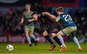 19 April 2024; Dayle Rooney of Bohemians in action against Conor Kane of Drogheda United during the SSE Airtricity Men's Premier Division match between Bohemians and Drogheda United at Dalymount Park in Dublin. Photo by Shauna Clinton/Sportsfile