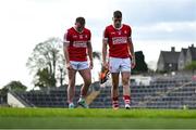 20 April 2024; Brian Hurley, left, and Ian Maguire of Cork leave the pitch after the Munster GAA Football Senior Championship semi-final match between Kerry and Cork at Fitzgerald Stadium in Killarney, Kerry. Photo by Brendan Moran/Sportsfile