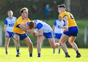 20 April 2024; Willie Beresford of Waterford in action against Alan Sweeney, left, and Brian McNamara of Clare during the Munster GAA Football Senior Championship semi-final match between Waterford and Clare at Fraher Field in Dungarvan, Waterford. Photo by Tyler Miller/Sportsfile
