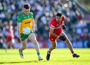 20 April 2024; Niall O'Donnell of Donegal in action against Christopher McKaigue of Derry during the Ulster GAA Football Senior Championship quarter-final match between Derry and Donegal at Celtic Park in Derry. Photo by Stephen McCarthy/Sportsfile