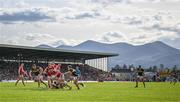 20 April 2024; Kevin Flahive of Cork gathers possession ahead of Dara Moynihan of Kerry during the Munster GAA Football Senior Championship semi-final match between Kerry and Cork at Fitzgerald Stadium in Killarney, Kerry. Photo by Brendan Moran/Sportsfile