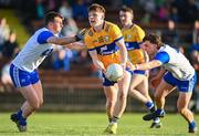 20 April 2024; Cormac Murray of Clare in action against Billy O'Keeffe, left, and Liam Fennell of Waterford during the Munster GAA Football Senior Championship semi-final match between Waterford and Clare at Fraher Field in Dungarvan, Waterford. Photo by Tyler Miller/Sportsfile