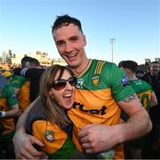 20 April 2024; Jason McGee of Donegal celebrates with supporter Carol McCann after the Ulster GAA Football Senior Championship quarter-final match between Derry and Donegal at Celtic Park in Derry. Photo by Stephen McCarthy/Sportsfile
