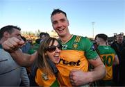 20 April 2024; Jason McGee of Donegal celebrates with supporter Carol McCann after the Ulster GAA Football Senior Championship quarter-final match between Derry and Donegal at Celtic Park in Derry. Photo by Stephen McCarthy/Sportsfile
