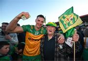 20 April 2024; Jason McGee of Donegal celebrates with supporter Charlie Gallagher after the Ulster GAA Football Senior Championship quarter-final match between Derry and Donegal at Celtic Park in Derry. Photo by Stephen McCarthy/Sportsfile