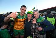 20 April 2024; Jason McGee of Donegal celebrates with supporters Charlie Gallagher and Stephen Doohan, right, after the Ulster GAA Football Senior Championship quarter-final match between Derry and Donegal at Celtic Park in Derry. Photo by Stephen McCarthy/Sportsfile