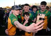 20 April 2024; Odhran Doherty of Donegal, centre back, celebrates witgh supporters after their side's victory in the Ulster GAA Football Senior Championship quarter-final match between Derry and Donegal at Celtic Park in Derry. Photo by Seb Daly/Sportsfile