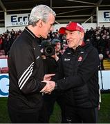 20 April 2024; Donegal manager Jim McGuinness, left, and Derry manager Mickey Harte shake hands after the Ulster GAA Football Senior Championship quarter-final match between Derry and Donegal at Celtic Park in Derry. Photo by Seb Daly/Sportsfile